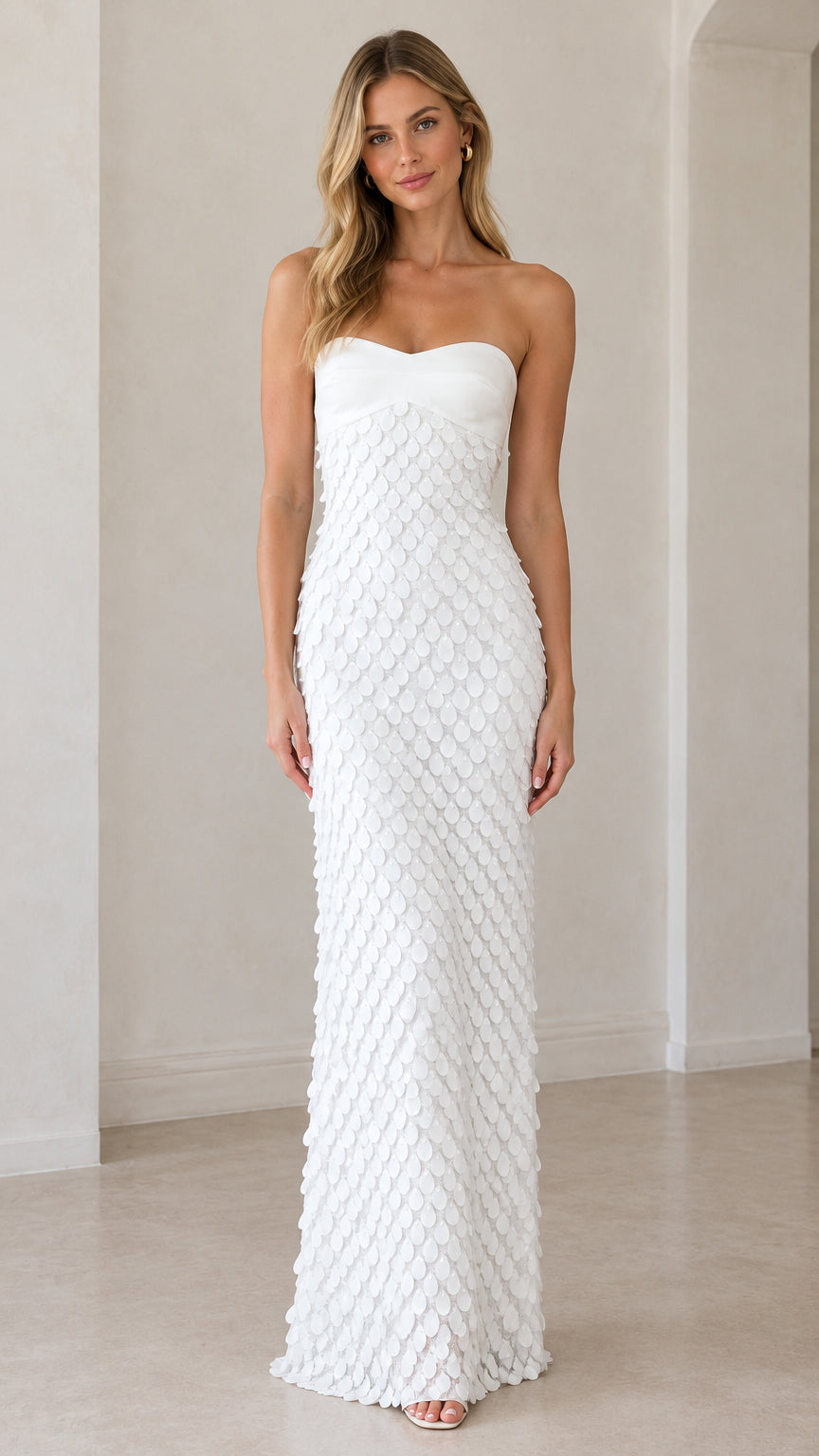 Front view of model wearing white strapless sweetheart petal textured maxi gown