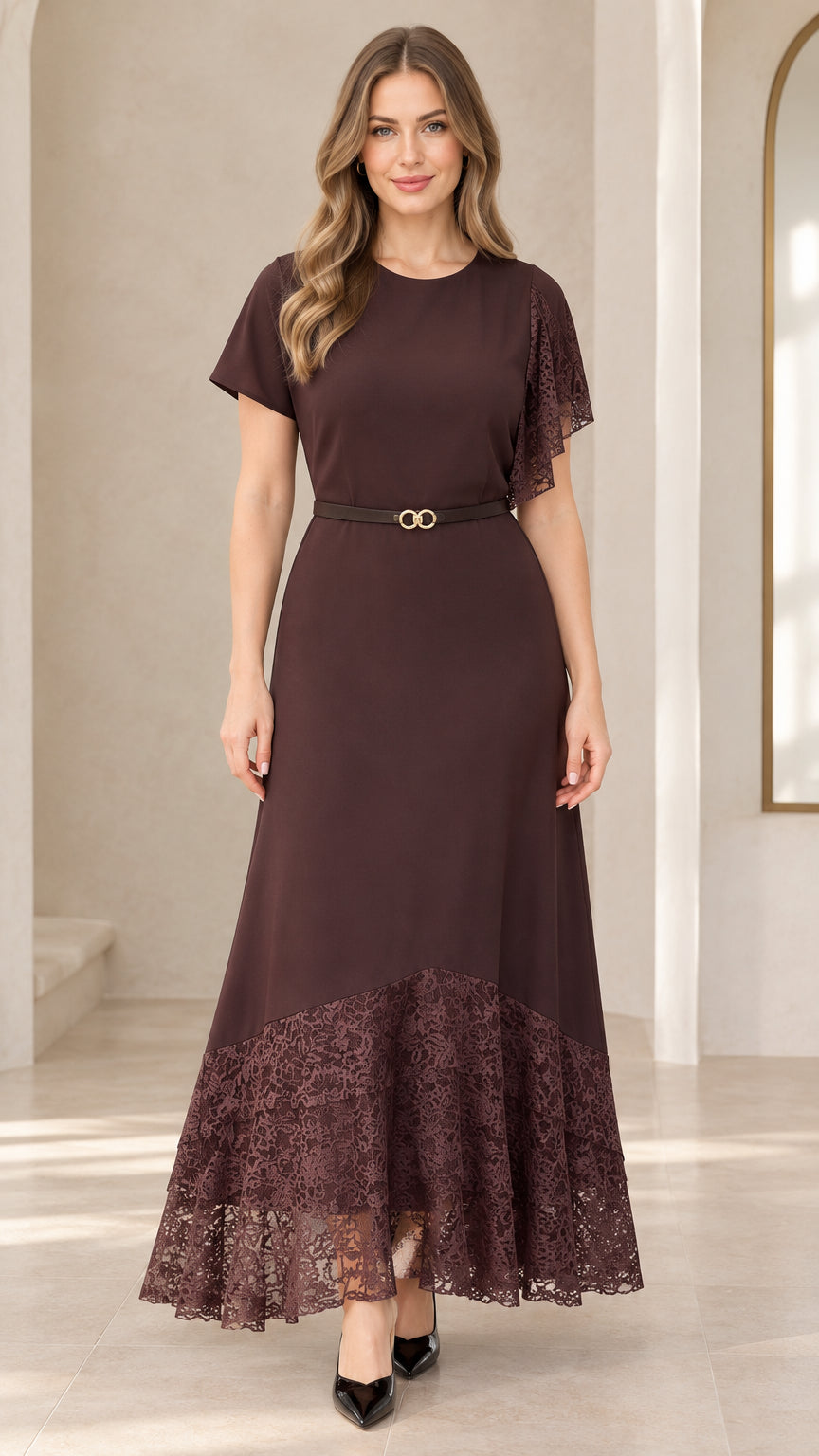 Front view of woman wearing chocolate brown lace patchwork maxi dress with belt