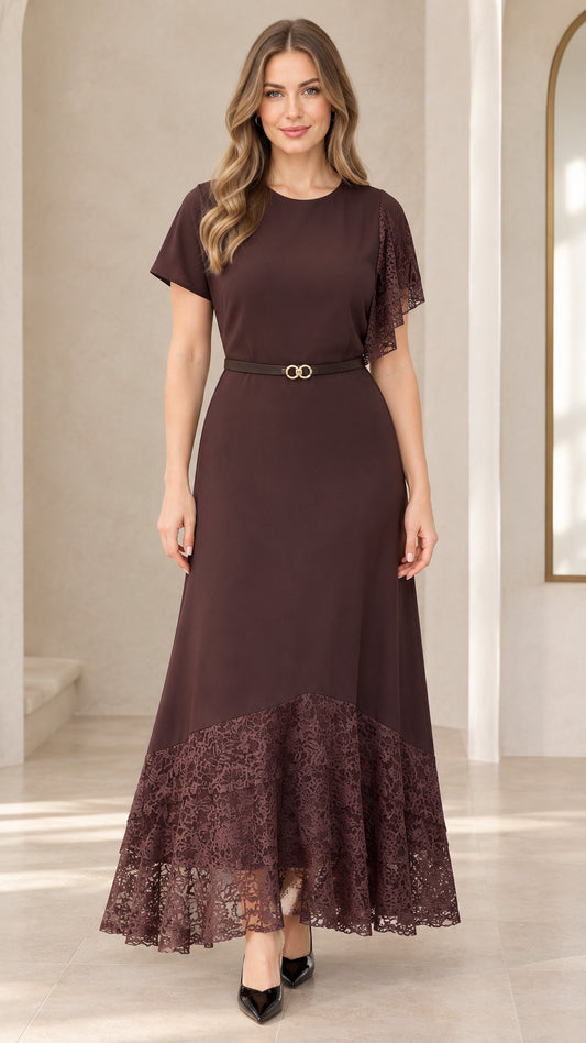 Front view of woman wearing chocolate brown lace patchwork maxi dress with belt
