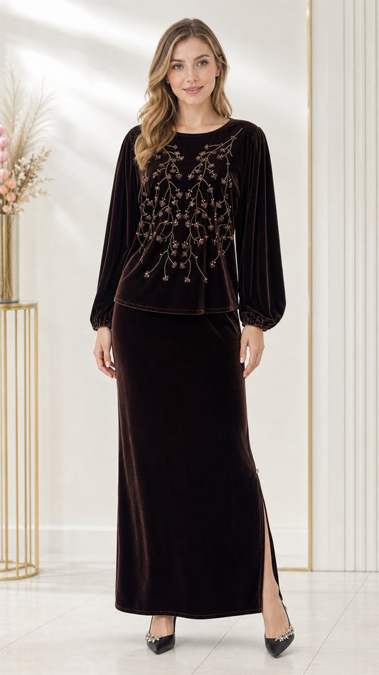 Front full-length view of woman wearing a dark brown beaded velvet two-piece maxi skirt set