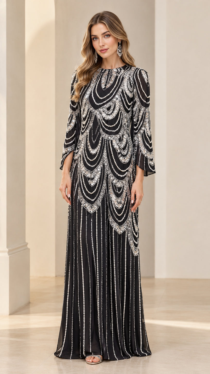 Front full-length view of woman wearing black sequin and beaded scallop maxi evening dress