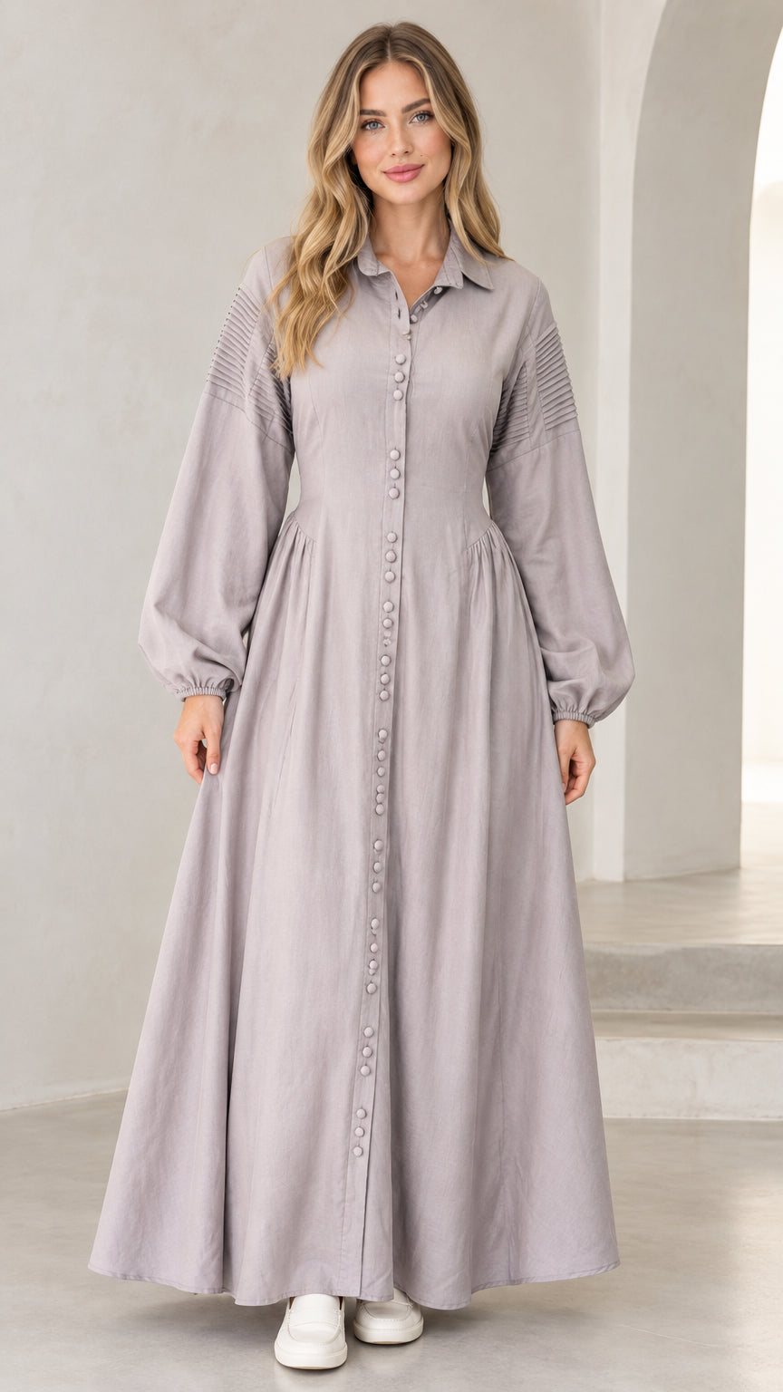 Front view of woman wearing lavender grey pleated shoulder button-down maxi shirt dress