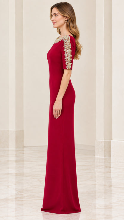 Side full-length view of model in burgundy column formal dress showing tailored fit
