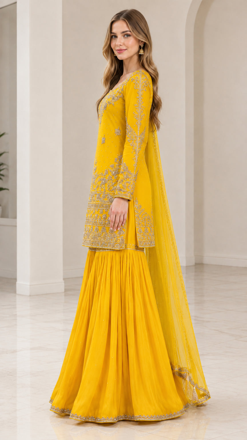 Side profile view of Mustard Yellow embroidered sharara suit set