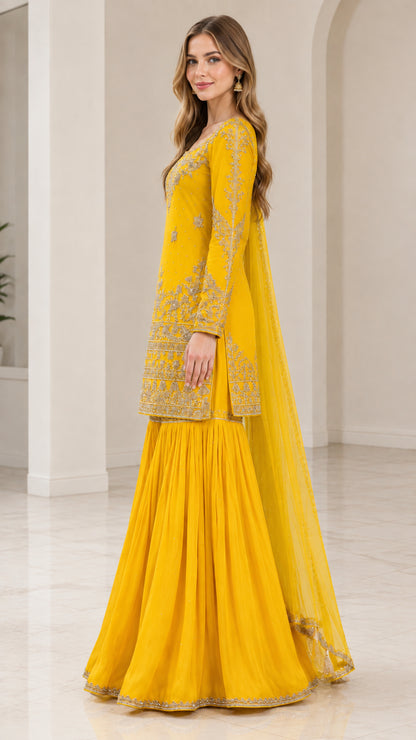 Side profile view of Mustard Yellow embroidered sharara suit set