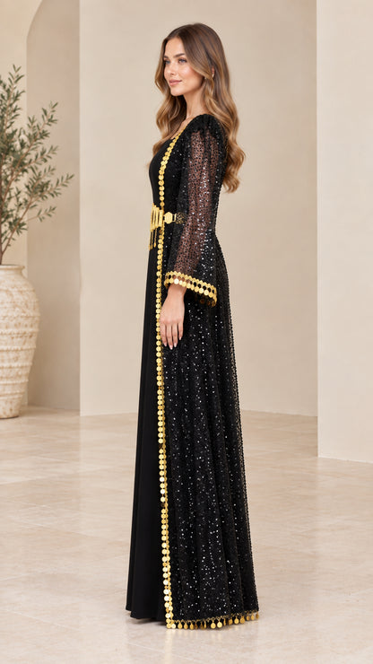 Side profile of black sequin kaftan evening gown with gold waist detail