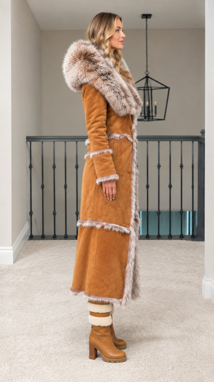 Side profile of woman in long camel faux suede winter coat with faux fur trim