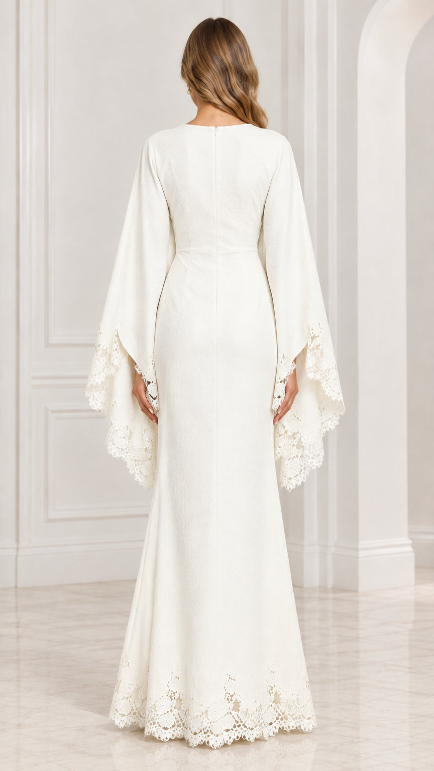 Back view of white evening dress with split cape sleeves and back zipper closure