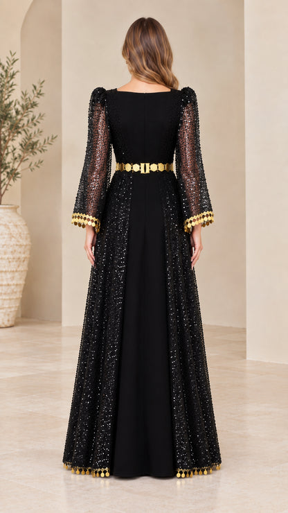 Back view of black sequin overlay maxi dress with long bell sleeves