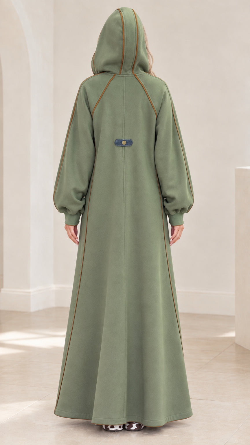 Back view of sage green longline hooded robe showing decorative back tab