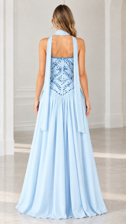 Back view of light blue formal gown showing trailing back scarf detail
