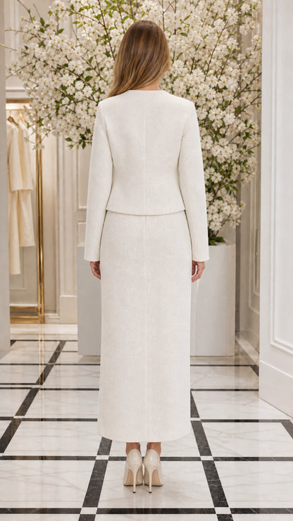 Back view of woman wearing Ivory White tailored jacket and maxi skirt