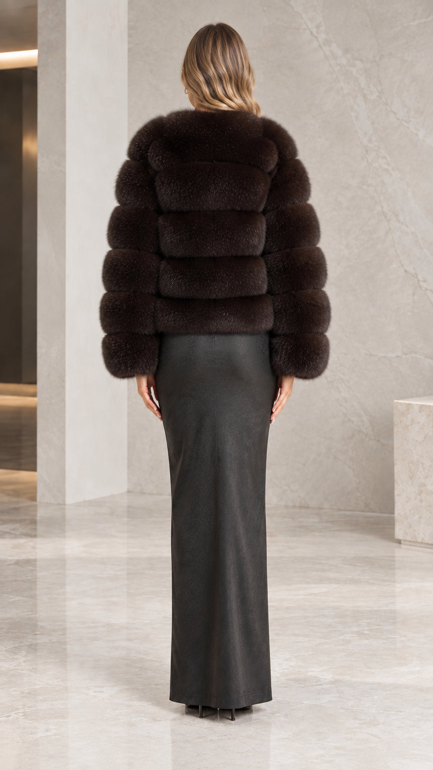 Back view of the espresso brown horizontal panel faux fur jacket