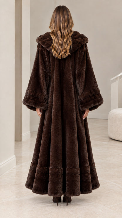 Back view showing the flared maxi silhouette and hood of chocolate brown faux fur coat