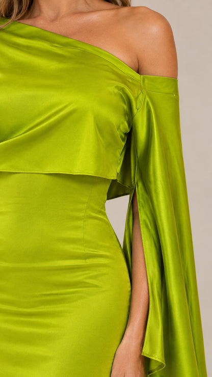 Close-up detail of lime green satin one-shoulder neckline and draped cape sleeve