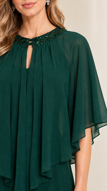 Close-up of sparkling beaded neckline and tiered chiffon capelet overlay