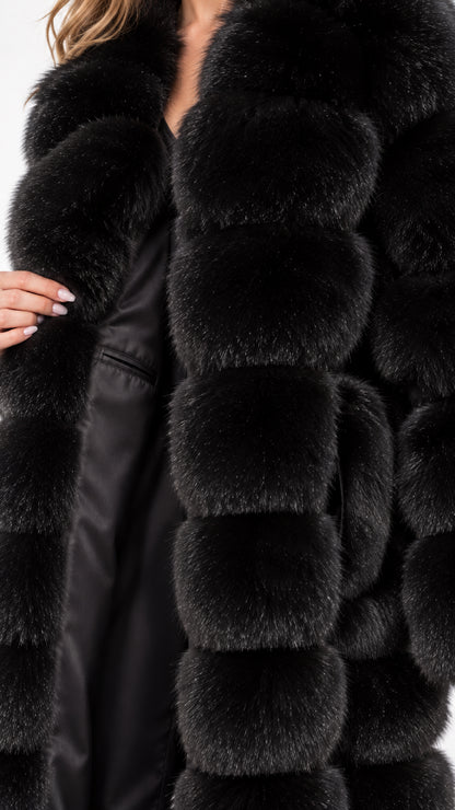 Close up of black plush faux fur texture and smooth inner lining