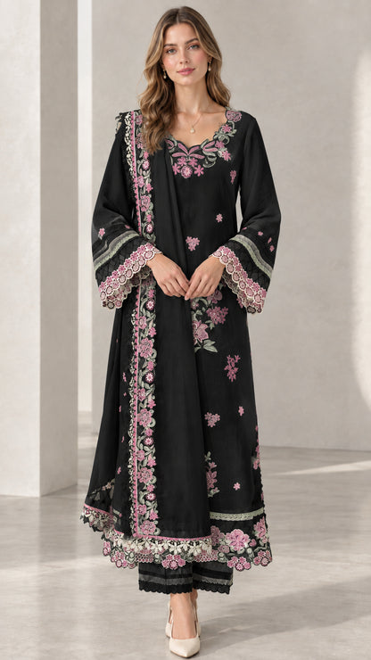 Full front view of model wearing Black floral embroidered 3-piece kurta set with scarf