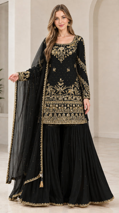 Full-length view of woman wearing Black gold-embroidered 3-piece sharara suit set