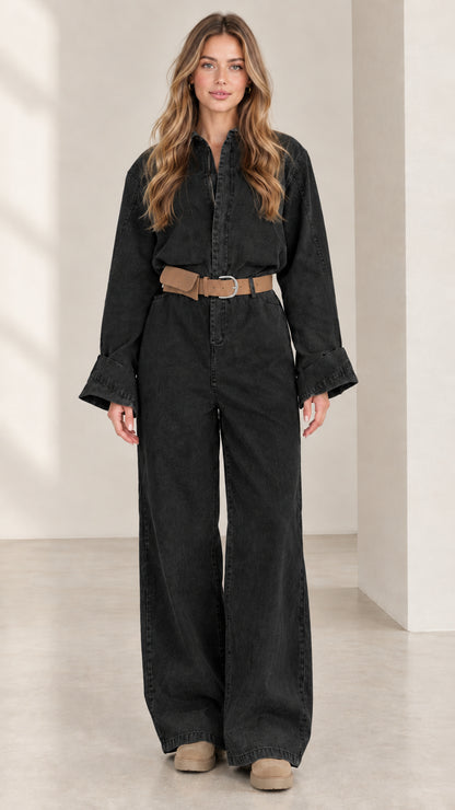 Front view of women's washed black long sleeve wide leg utility jumpsuit