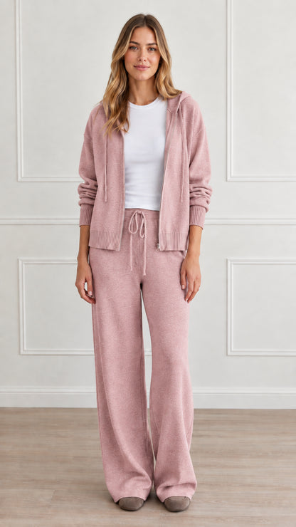 Front view of model wearing dusty pink knit zip-up hoodie and matching wide-leg lounge pants