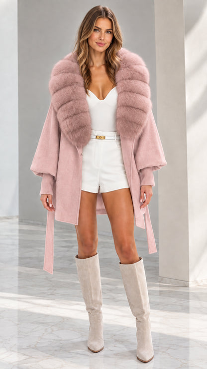 Front view of woman wearing Dusty Pink faux fur collar belted cape jacket