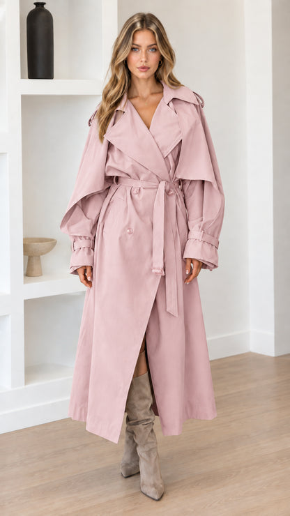 Full-length view of woman wearing Dusty Pink belted maxi trench coat