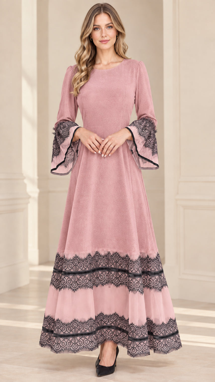 Model wearing dusty pink velvet maxi dress with contrast tiered lace detailing
