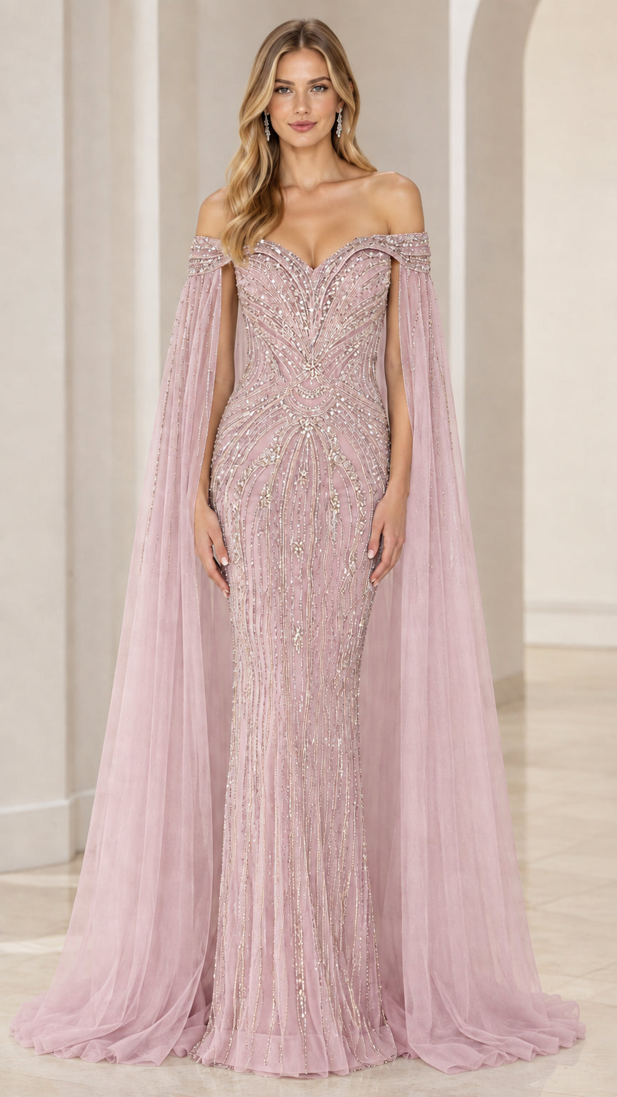 Front view of blush pink embellished off-the-shoulder formal gown with cape sleeves