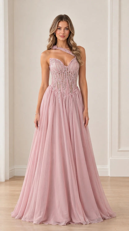 Model wearing Dusty Pink beaded corset maxi gown with flowing A-line skirt
