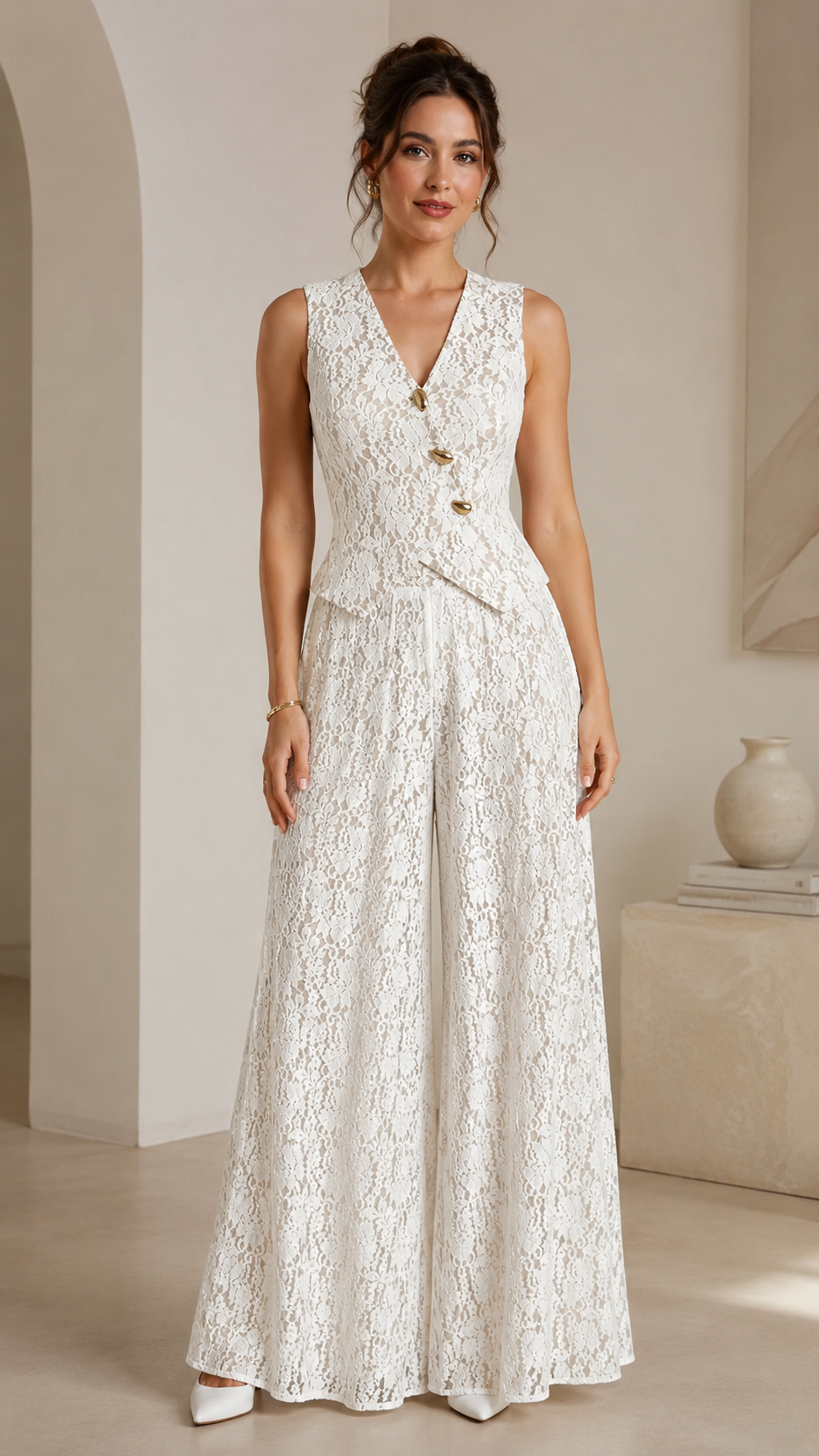 Ivory front view of sleeveless lace jumpsuit with wide-leg silhouette