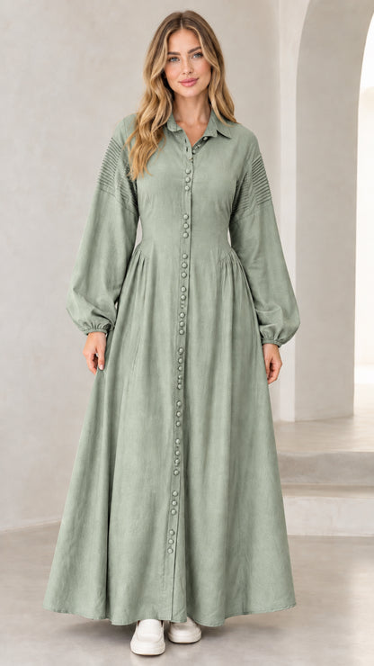 Front view of woman wearing sage green button-down maxi shirt dress