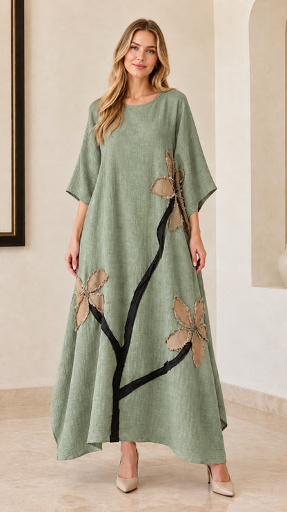 Woman wearing sage green floral appliqué relaxed maxi dress