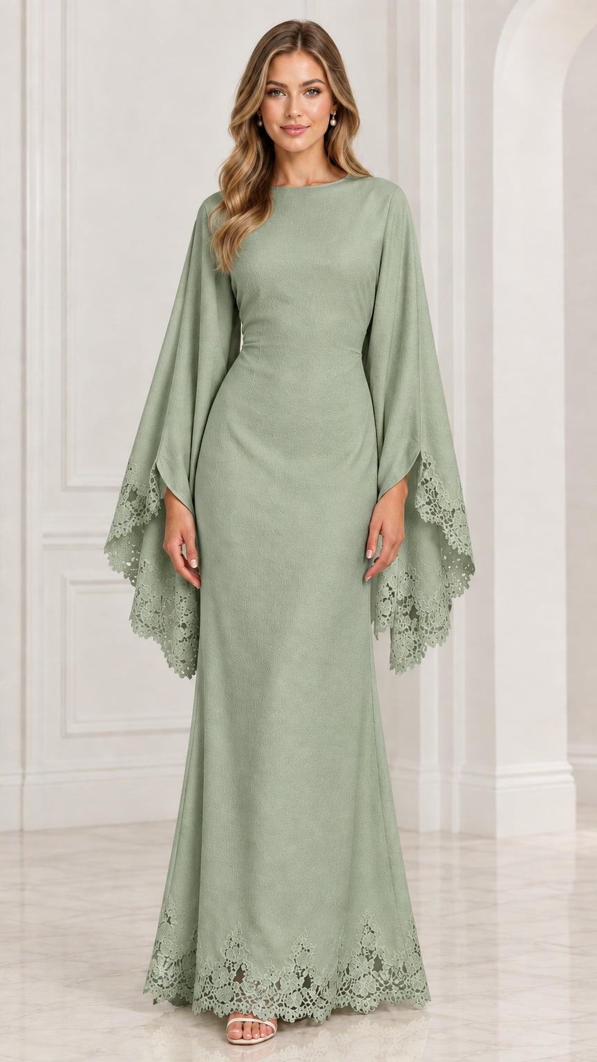 Front view of model wearing sage green boat neck evening gown with lace details
