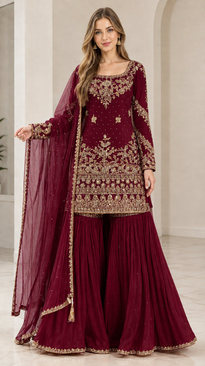 Full-length view of woman wearing Maroon wine embroidered sharara suit set