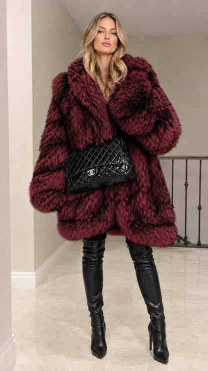 Model wearing Burgundy red hooded plush faux fur winter jacket