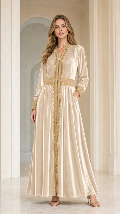 Full front view of model wearing Champagne beige velvet embroidered kaftan maxi dress