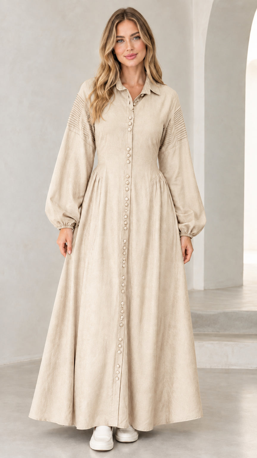 Front view of woman wearing beige oatmeal long sleeve button-down maxi dress