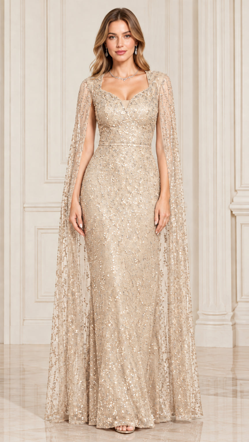 Front view of champagne gold sequin cape evening gown