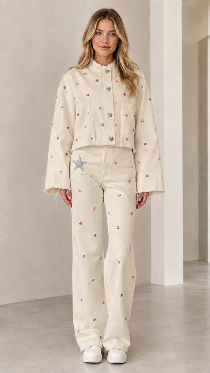 Full front view of cream off-white rhinestone cropped jacket and pant set