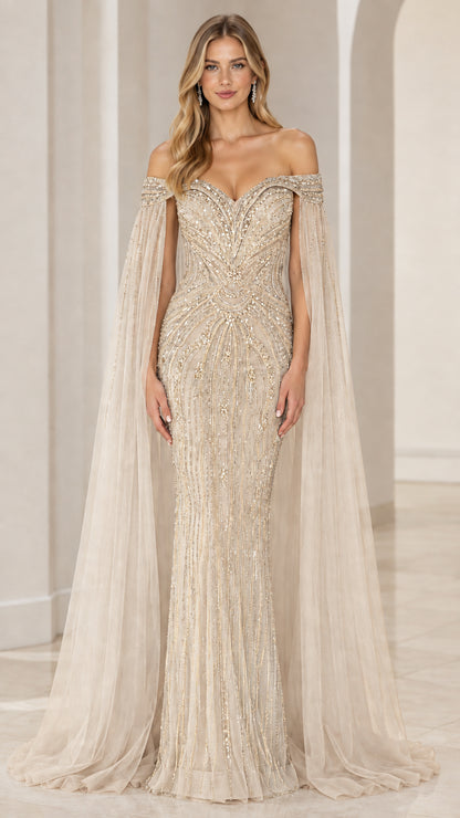 Front view of champagne gold sequined off-the-shoulder mermaid gown with cape