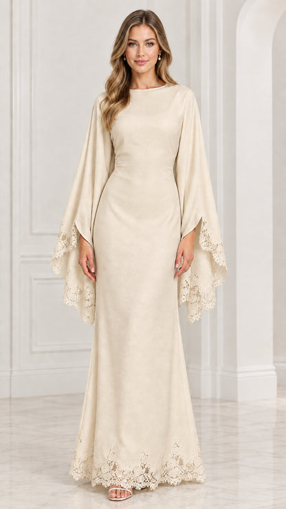 Front view of model wearing champagne cream evening maxi dress with cape sleeves