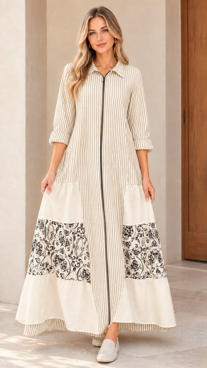 Front view of women's beige striped zip-front maxi dress with floral patchwork